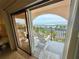Inviting balcony view with rocking chairs overlooking the ocean at 30 Inlet Harbor Rd # 606, Ponce Inlet, FL 32127