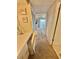 Hallway with vanity area leading to a bedroom offering beautiful views at 30 Inlet Harbor Rd # 606, Ponce Inlet, FL 32127
