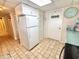 Functional kitchen with white refrigerator at 30 Inlet Harbor Rd # 606, Ponce Inlet, FL 32127