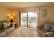 Cozy living room featuring comfortable seating, a balcony, and amazing ocean views at 30 Inlet Harbor Rd # 606, Ponce Inlet, FL 32127