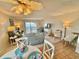 Cozy living room with ocean view and unique ceiling fan at 30 Inlet Harbor Rd # 606, Ponce Inlet, FL 32127