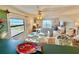 Living room with ocean view from the kitchen island at 30 Inlet Harbor Rd # 606, Ponce Inlet, FL 32127