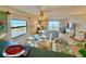 Comfortable living room featuring an ocean view and a dining table at 30 Inlet Harbor Rd # 606, Ponce Inlet, FL 32127