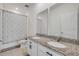 Bathroom features double sinks and granite countertops at 3116 Crab Trap Dr, New Smyrna Beach, FL 32168
