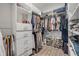 Organized walk-in closet with shelving, drawers, and ample storage space at 3116 Crab Trap Dr, New Smyrna Beach, FL 32168