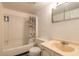 Bathroom with a shower-tub combo and a vanity with ample storage at 3800 Saxon Dr # 180, New Smyrna Beach, FL 32169