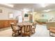 Recreation room with a kitchenette, dining area, and comfortable lounge seating at 3800 Saxon Dr # 180, New Smyrna Beach, FL 32169