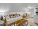 Finished attic space perfect for a cozy retreat with neutral carpet and modern decor at 402 N Orange St, New Smyrna Beach, FL 32168