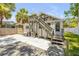 Backyard featuring stairs, grill, and deck at 402 N Orange St, New Smyrna Beach, FL 32168