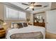 Bedroom with carpet, window and ceiling fan at 402 N Orange St, New Smyrna Beach, FL 32168