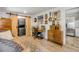 The main living area offers a desk, and a tucked-away washer and dryer at 402 N Orange St, New Smyrna Beach, FL 32168