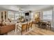 Open living space with lots of natural light, featuring a fireplace and cozy seating areas at 402 N Orange St, New Smyrna Beach, FL 32168