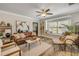 Inviting living room featuring a cozy window seat and stylish décor, creating a comfortable atmosphere at 402 N Orange St, New Smyrna Beach, FL 32168