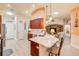Lovely kitchen with breakfast bar, stainless appliances, and lots of storage at 406 Phillips Creek Ln, New Smyrna Beach, FL 32168