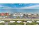 Stunning aerial view of a beachfront property and nearby condos, with the beautiful ocean as a backdrop at 4150 S Atlantic Ave # 111B, New Smyrna Beach, FL 32169