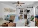 Bedroom showcasing a full bed, exercise equipment, and a closet at 4150 S Atlantic Ave # 111B, New Smyrna Beach, FL 32169