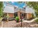 Charming two-story home with a balcony, screened-in porch, well-maintained landscaping, and unique architectural details at 4150 S Atlantic Ave # 111B, New Smyrna Beach, FL 32169
