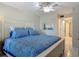 Inviting bedroom with stylish furniture and plenty of natural light at 4155 S Atlantic Ave # 111, New Smyrna Beach, FL 32169