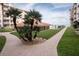 Beautifully landscaped path between condos leading to the beach and pool at 4155 S Atlantic Ave # 111, New Smyrna Beach, FL 32169