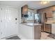 Well-equipped kitchen with stainless steel appliances and modern finishes at 4155 S Atlantic Ave # 111, New Smyrna Beach, FL 32169