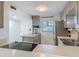 Efficient kitchen with stainless steel appliances and ample counter space at 4155 S Atlantic Ave # 111, New Smyrna Beach, FL 32169