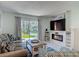 Relaxing living room with comfortable seating and view of the outdoor area at 4155 S Atlantic Ave # 111, New Smyrna Beach, FL 32169