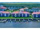 Waterfront residences with boat docks and waterway views define the community at 454 Bouchelle Dr # 202, New Smyrna Beach, FL 32169