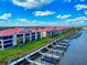Beautiful waterfront condo community featuring private boat docks and red roofs at 454 Bouchelle Dr # 202, New Smyrna Beach, FL 32169