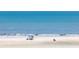 People enjoying a beautiful day at the beach in front of the condos at 4555 S Atlantic Ave # 4310, Port Orange, FL 32127