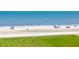 People enjoying a beautiful day at the beach with beach umbrellas at 4555 S Atlantic Ave # 4310, Port Orange, FL 32127