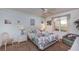 Comfortable bedroom with ceiling fan, carpeted floor, a queen bed, and a view at 4555 S Atlantic Ave # 4310, Port Orange, FL 32127