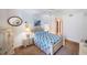 Bright and airy bedroom with a carpeted floor, queen bed, and closet at 4555 S Atlantic Ave # 4310, Port Orange, FL 32127