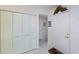 The entryway features a white front door, closet, tile flooring, and decorative accents, creating a welcoming first impression at 4555 S Atlantic Ave # 4310, Port Orange, FL 32127