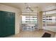 Enclosed patio featuring tile floors, ceiling fan, and outdoor seating, perfect for relaxing at 4555 S Atlantic Ave # 4310, Port Orange, FL 32127