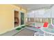 View of the patio featuring slider to the bedroom and view of the backyard at 5146 Pineland Ave, Port Orange, FL 32127