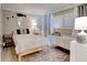Charming bedroom featuring twin beds, sea-themed décor, and a bright, inviting atmosphere at 5207 S Atlantic Ave # 224, New Smyrna Beach, FL 32169