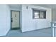 Welcoming condo entryway featuring a stylish door and charming nautical accents at 5207 S Atlantic Ave # 224, New Smyrna Beach, FL 32169
