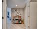 Light-filled condo entryway boasting modern décor and convenient access to storage and living areas at 5207 S Atlantic Ave # 224, New Smyrna Beach, FL 32169