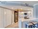 Open-concept kitchen featuring stainless steel appliances and modern countertops with bar seating at 5207 S Atlantic Ave # 224, New Smyrna Beach, FL 32169