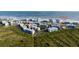 Coastal condo complex with convenient beach access amidst lush greenery and scenic views at 5300 S Atlantic Ave # 5-502, New Smyrna Beach, FL 32169