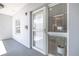 Apartment front door showing unit number 5502 and a sidelight window with blinds at 5300 S Atlantic Ave # 5-502, New Smyrna Beach, FL 32169