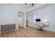 Bright office space with wood floors, a modern desk setup, and ample natural light at 5300 S Atlantic Ave # 5-502, New Smyrna Beach, FL 32169