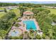A top-down view of a community pool and surrounding amenities at 5849 Ansley Way, Mount Dora, FL 32757