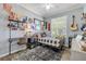 Teenage bedroom with desk, fan, and sports themed decor at 5849 Ansley Way, Mount Dora, FL 32757