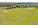 A large green recreation field perfect for outdoor activities and sports in the community at 5849 Ansley Way, Mount Dora, FL 32757