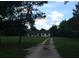 Ranch style home with large yard and long driveway at 4500 S Hiawassee Rd, Orlando, FL 32835