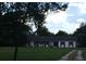 Ranch style home with a carport and spacious yard at 4500 S Hiawassee Rd, Orlando, FL 32835