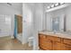 Bright bathroom with a shower/tub combo and vanity at 5244 Oakbourne Ave, Davenport, FL 33837