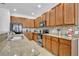 Modern kitchen with granite countertops and stainless steel appliances at 5244 Oakbourne Ave, Davenport, FL 33837