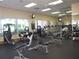 A gym with treadmills, weight machines, and stationary bikes for residents to exercise and stay in shape at 3918 Doune Way, Clermont, FL 34711